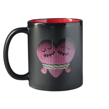 Black mug with red interior featuring The Lovers avatar from Trivia Murder Party 2 
