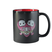 Black mug with red interior featuring The Lovers avatar from Trivia Murder Party 2 